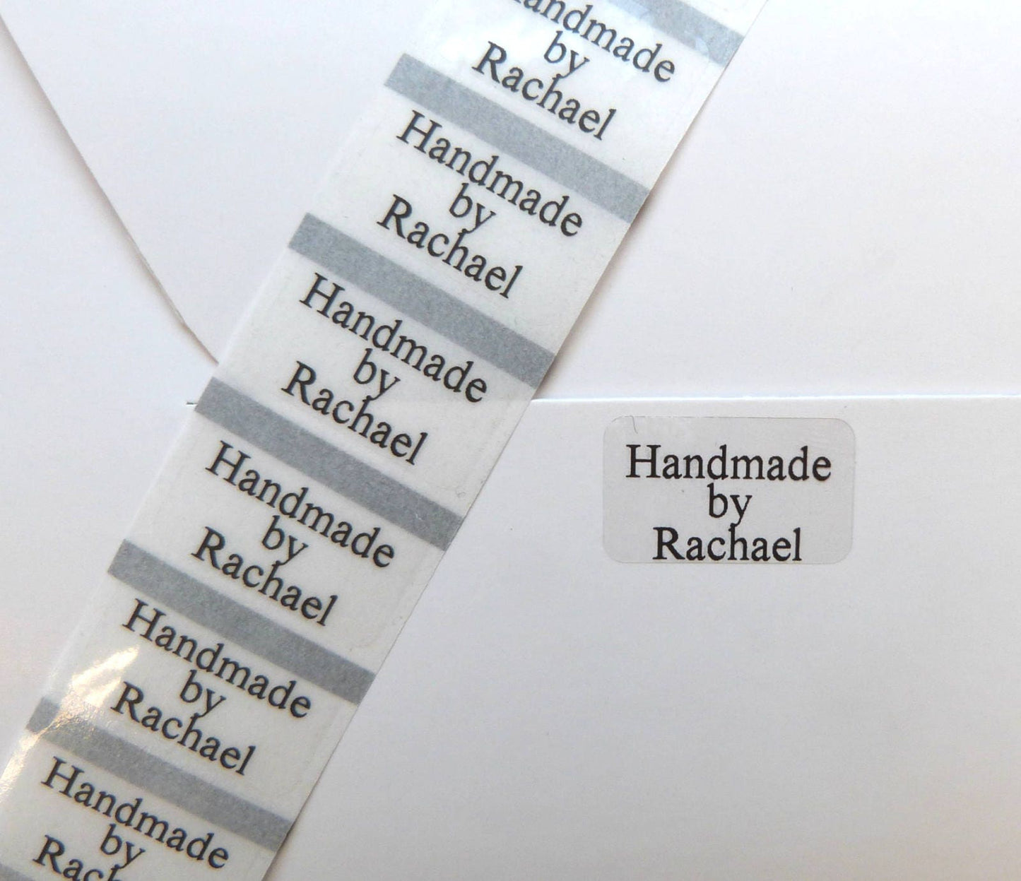 100 x small clear personalised handmade by labels- seals 22 x 14mm