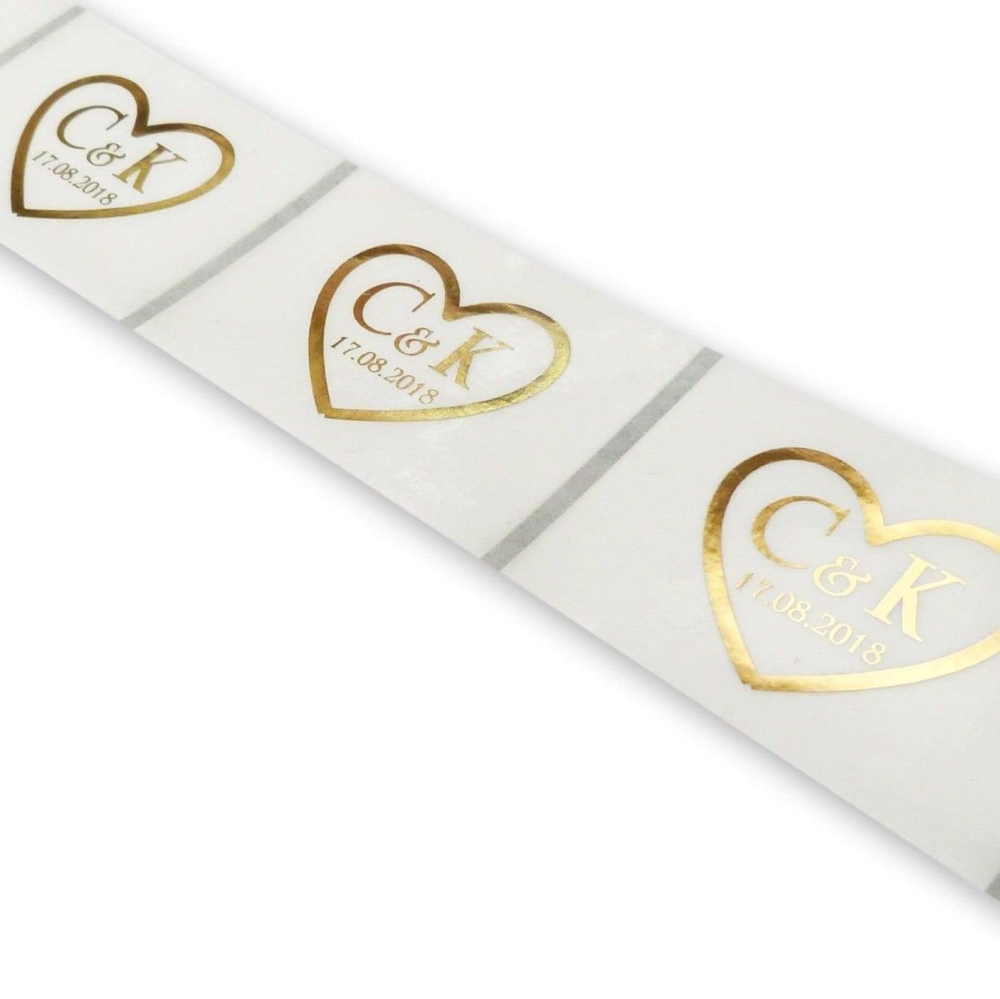 100 x Clear 64mm x 45mm Gold foil heart initials and date wedding labels favour stickers