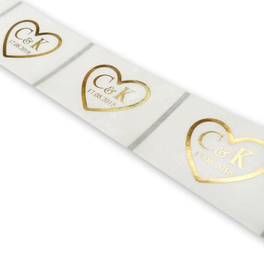 100 x Clear 64mm x 45mm Gold foil heart initials and date wedding labels favour stickers