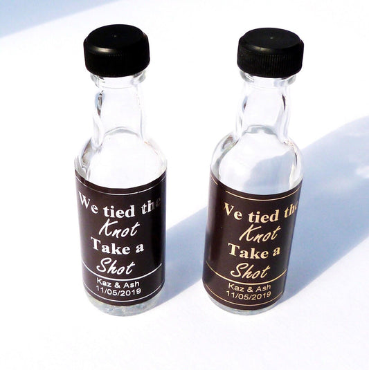 Wedding favour alcohol bottles black labels gold silver print we tied the knot